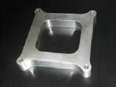 one inch thick open hole alum carb spacer.jpg